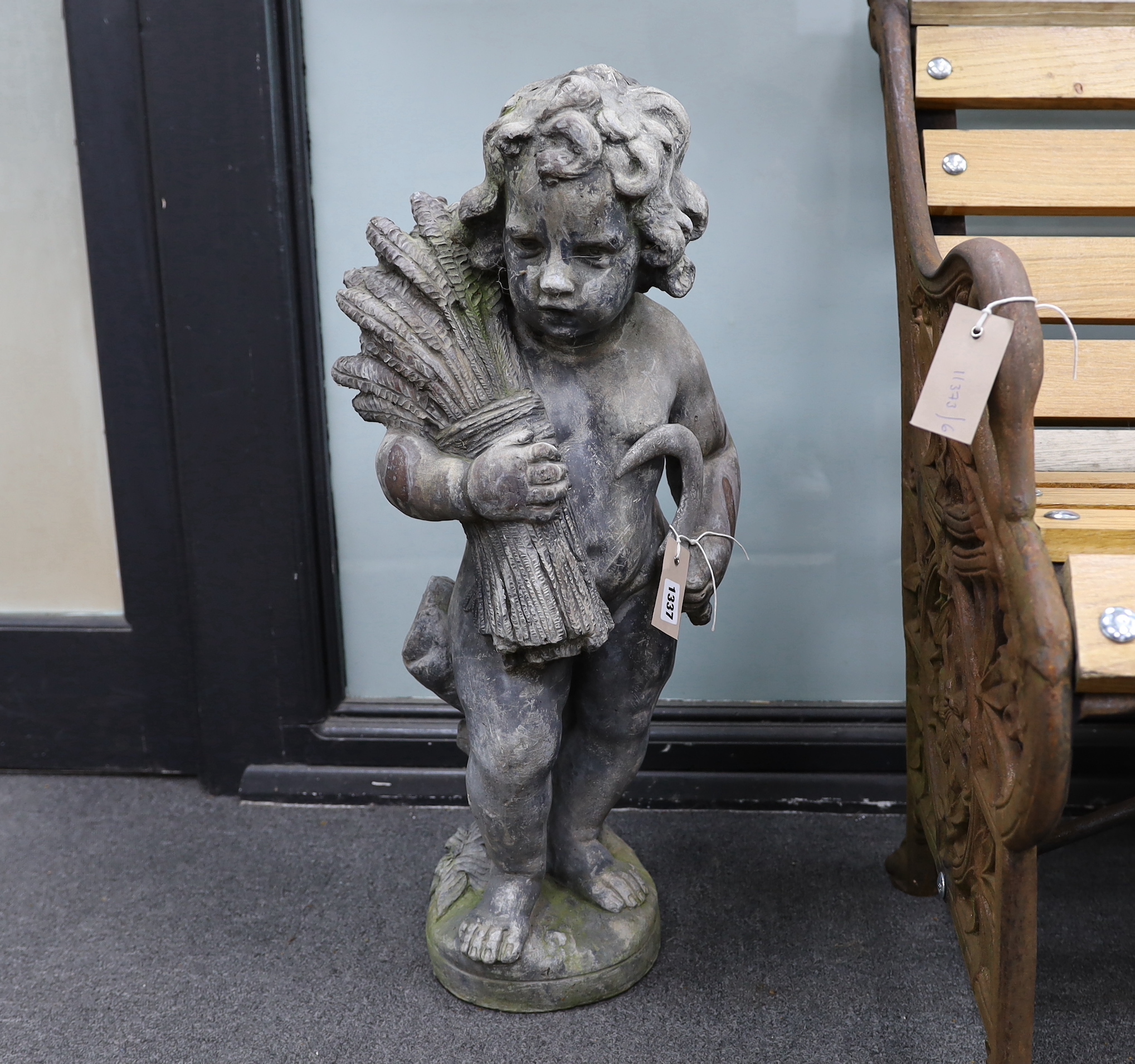 A pair of H. Crowthers lead garden ornaments emblematic of Summer and Winter, larger height 73cm